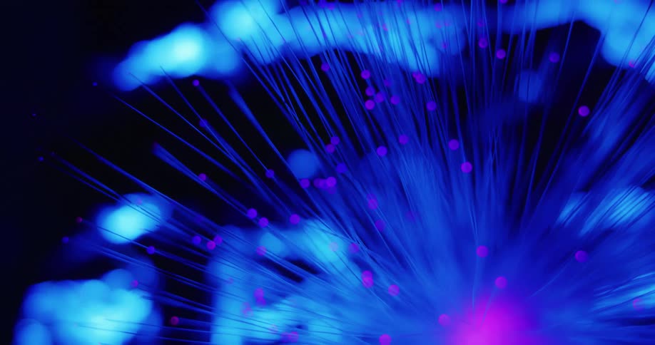 A multicolored laser light with spikes coming out of it