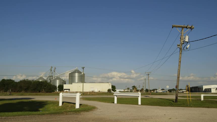 View of a farm and country on sunny day