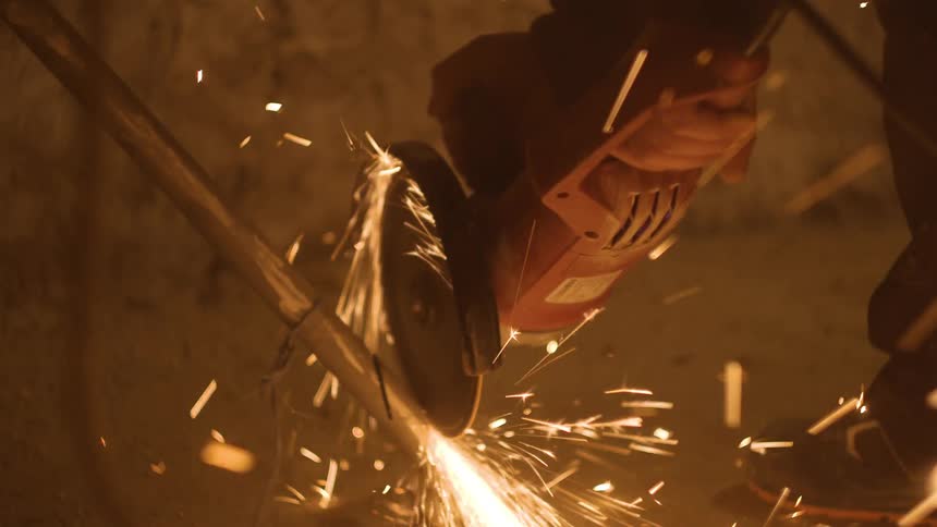 A man is working in a factory in the day time
