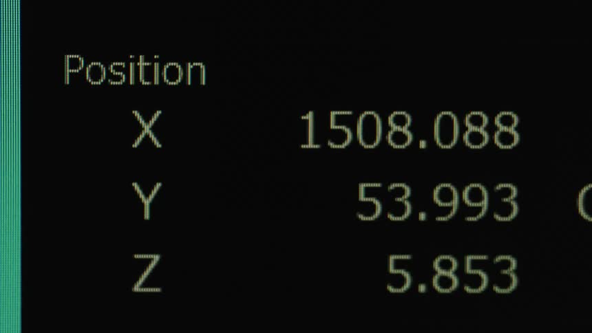 A black screen with words letters and numbers increasing and decreasing in yellow