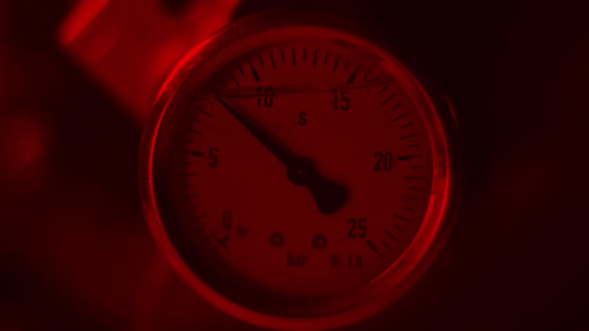 Close up view of a clock ticking is displayed