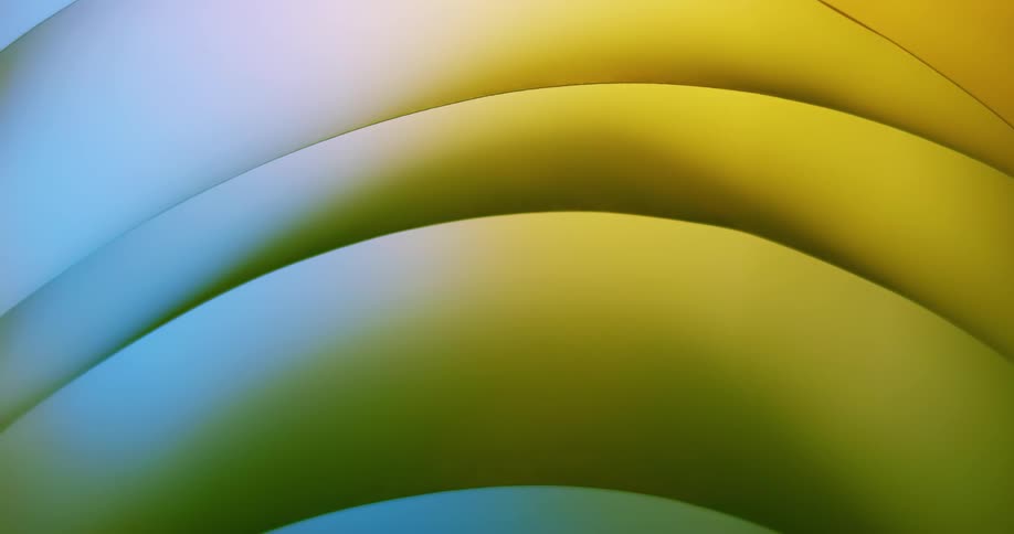 Light shines across yellow and white stacked folds