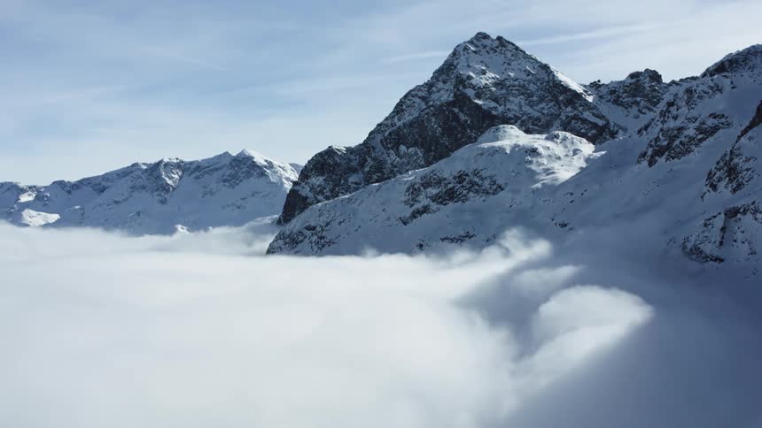 Winter Majesty: Aerial Splendor of Snowy Mountains