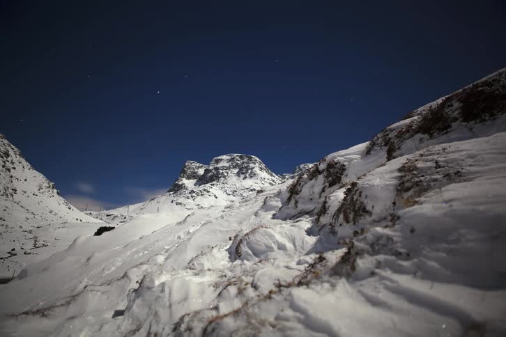 Snowy Mountain Time-Lapse: Majestic Beauty Unfolding