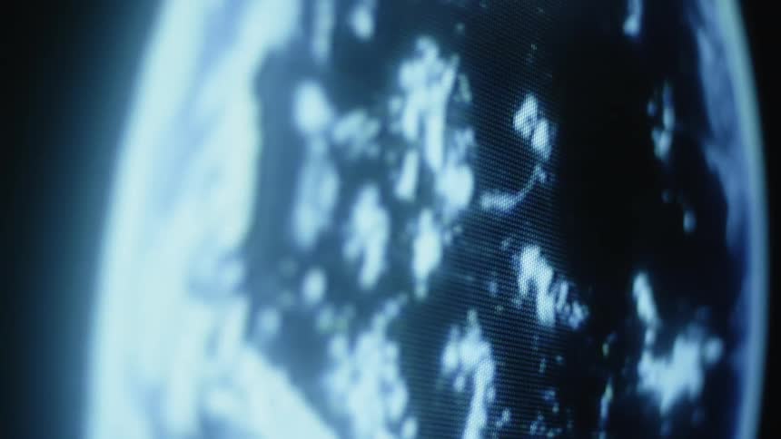 The hologram of the planet is spinning
