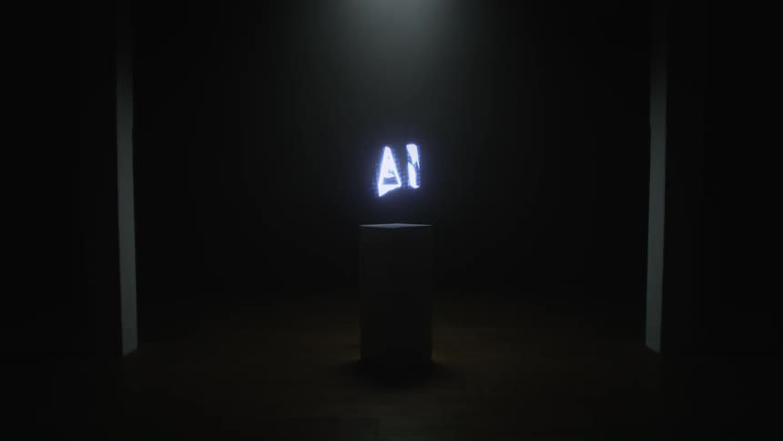 Close up of digital graphics spinning on a screen inside a dimly lit room