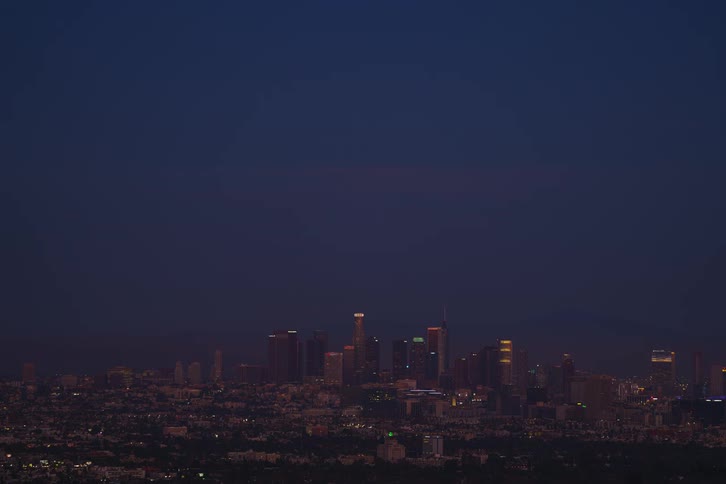 The view is of the downtown area through out the day