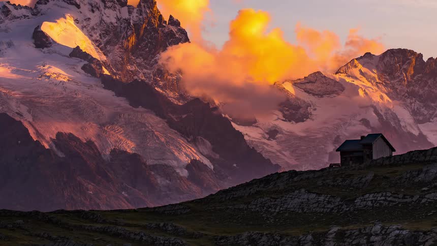 A small shelter is by the mountain
