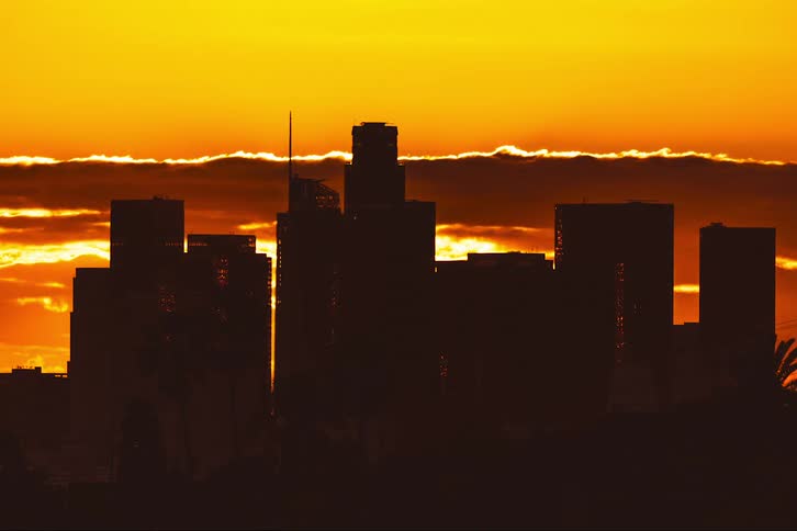 The view is of the downtown area throughout the day