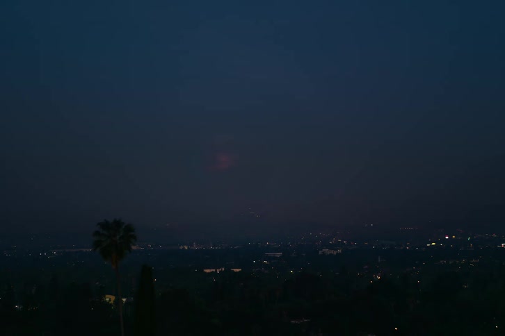 The view is of the downtown area at night time