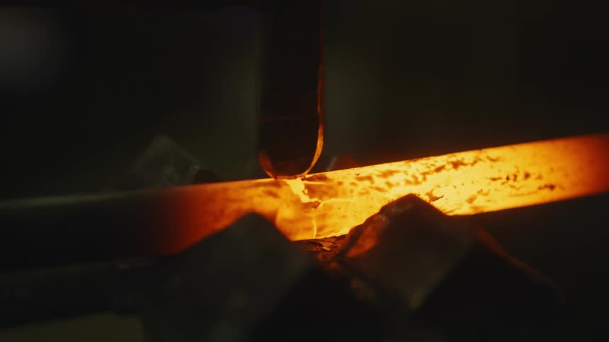 Hot metal is being formed