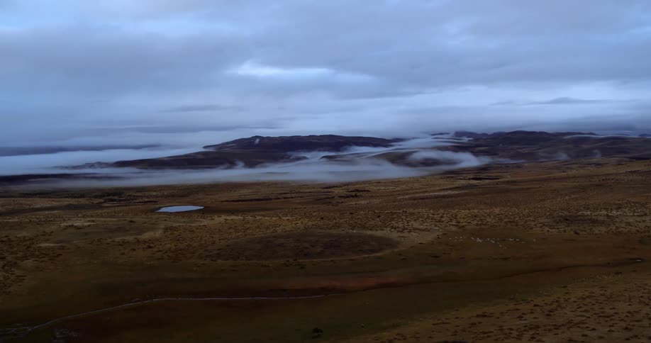 Fog is covering the landscape during the day time