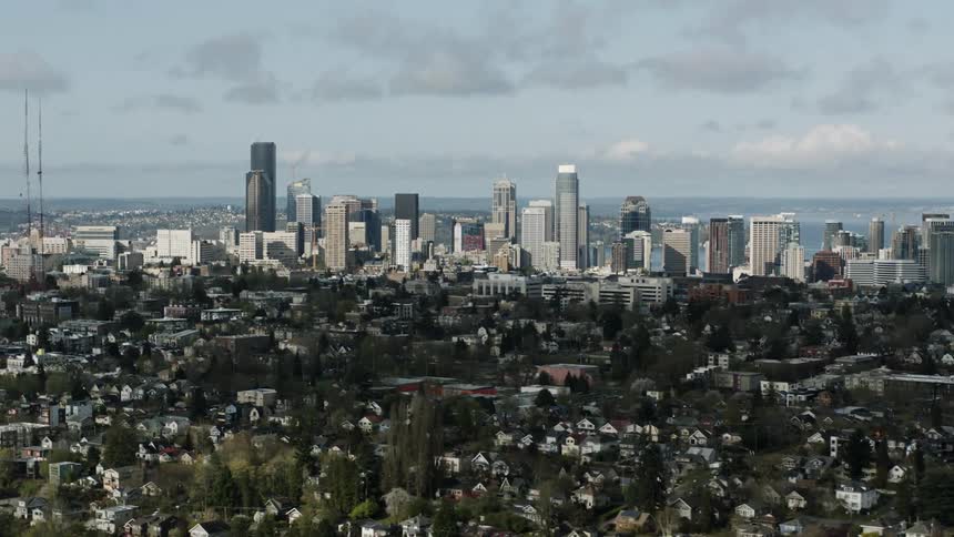 City skyscrapers are shown in the distance