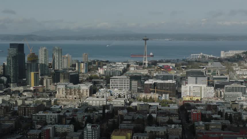 The coastal city has a clear sky above