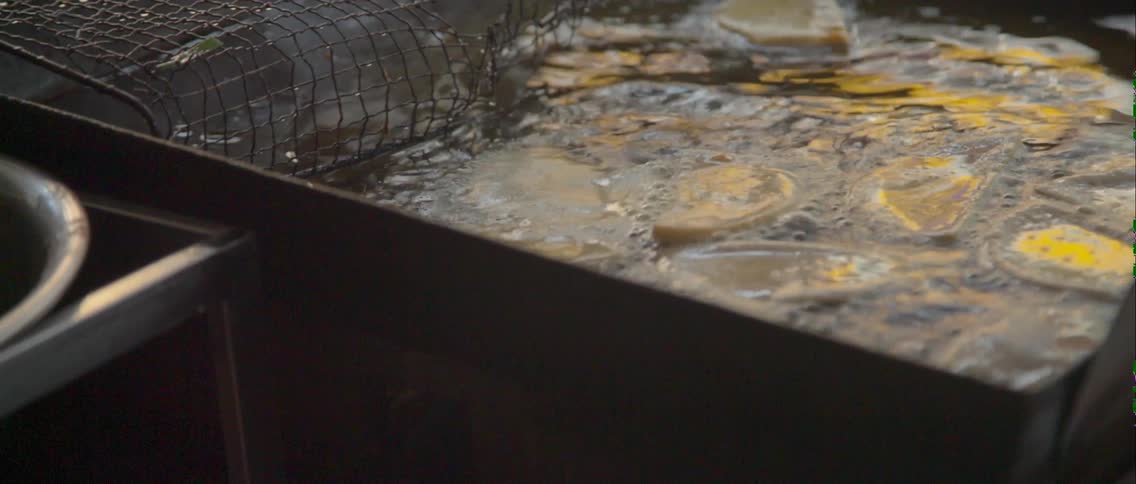 Food is cooking in a fryer