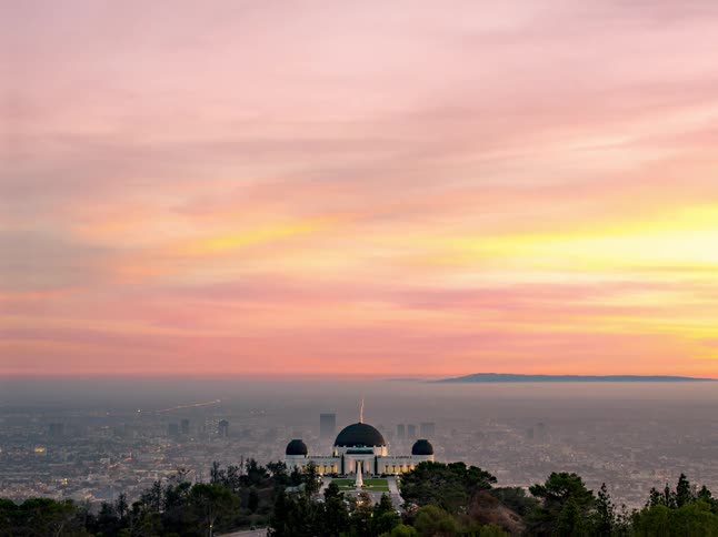 Time lapse of los angeles from behind griffith observatory sunrise to sunset