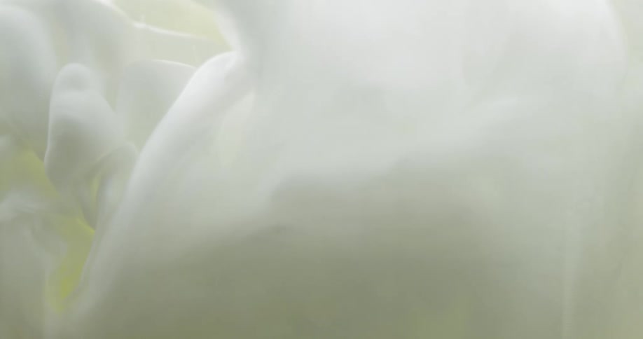 White liquid is poured into water