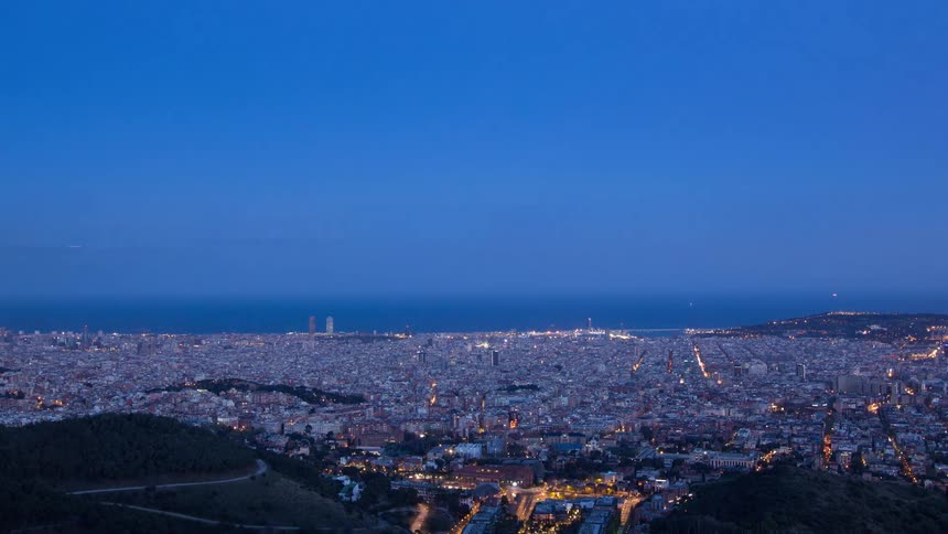 Time lapse view of a city skyline is displayed