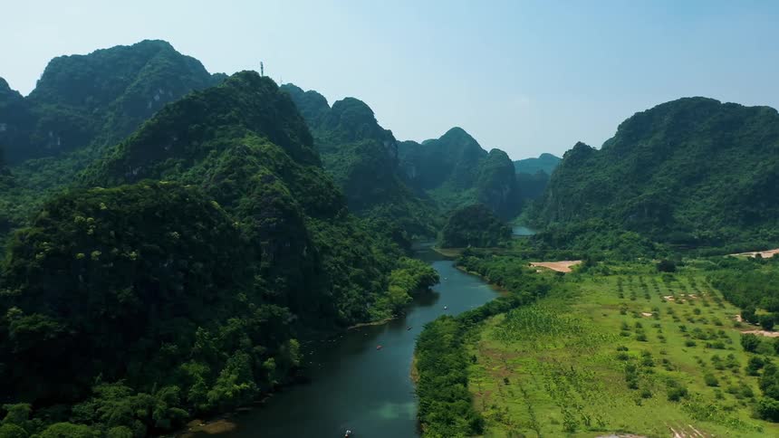 Aerial view of a mountain landscape during spring is displayed