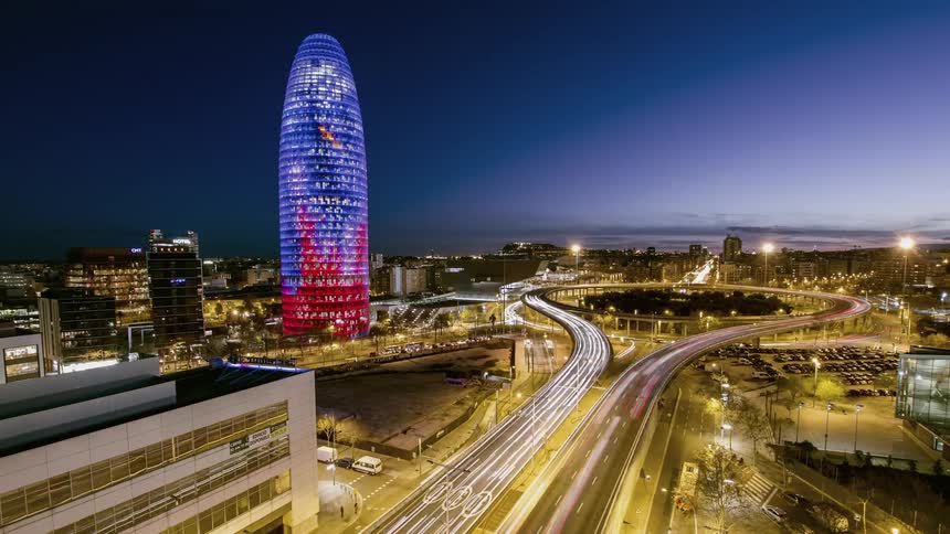 The view is of the downtown area at night time