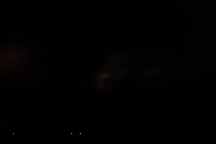 Lightning flashes in a dark sky