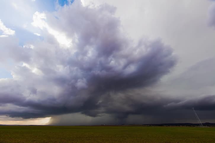 Time lapse of a tornado forming on a field