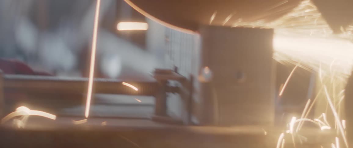 Sparks fly as a saw cuts through metal