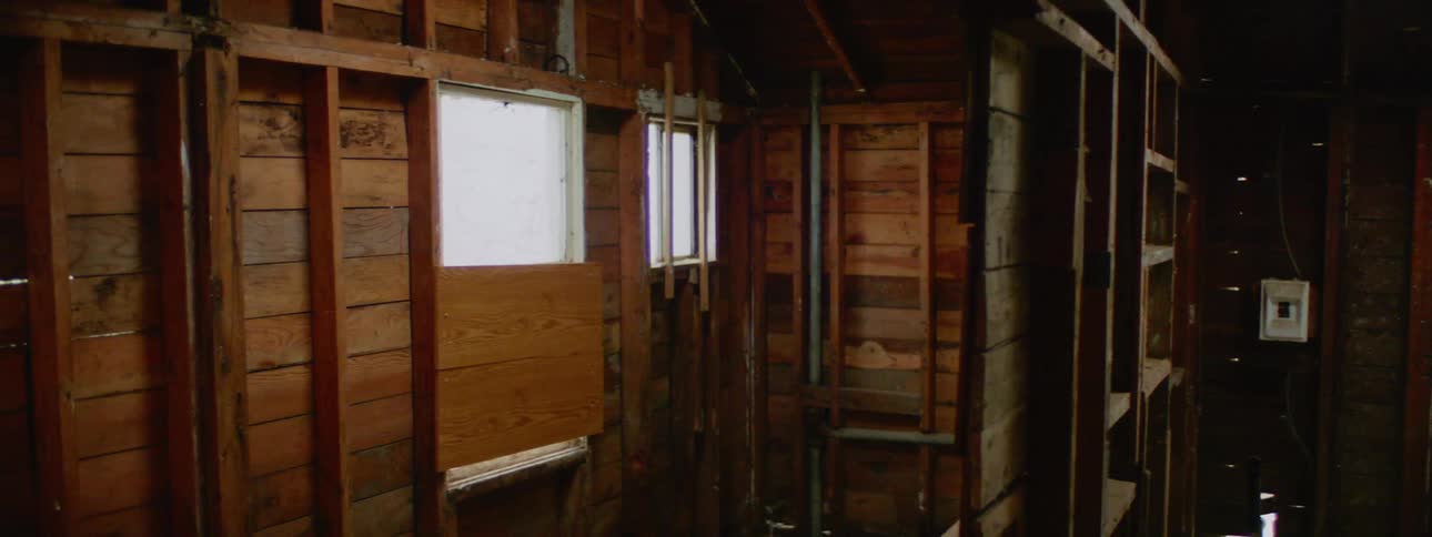 The house is empty with wooden walls