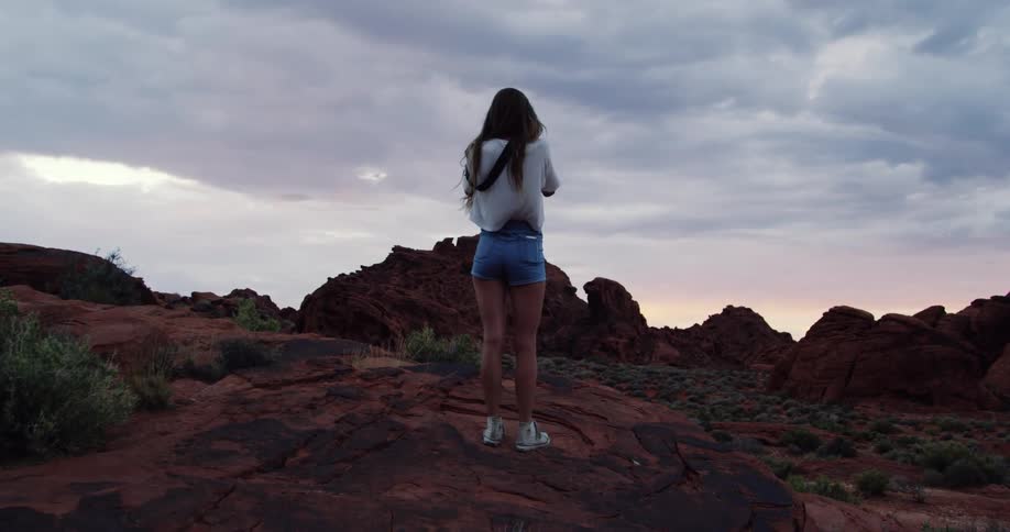 A woman is taking photographs