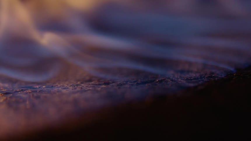 Close up view of a bonfire is displayed