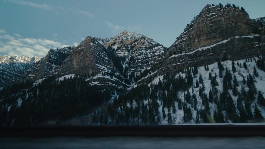 A shot of a mountain from road