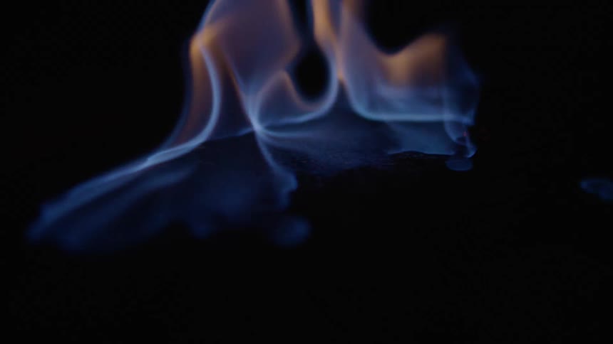 The fire is burning in the dark
