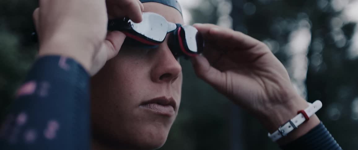 Girl with swimsuit wears goggles