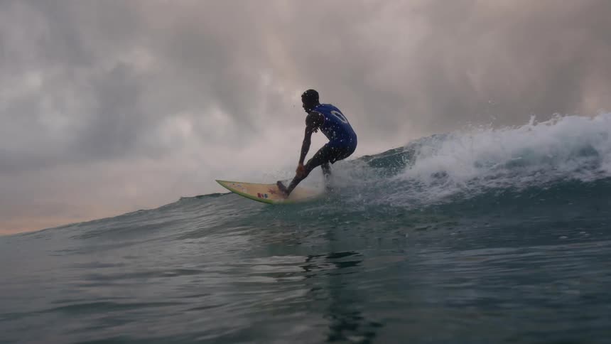 The view is of someone surfing in the day time