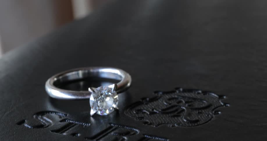A diamond ring is on display