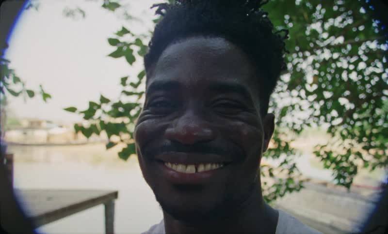 A shot of black male smiling at the crime