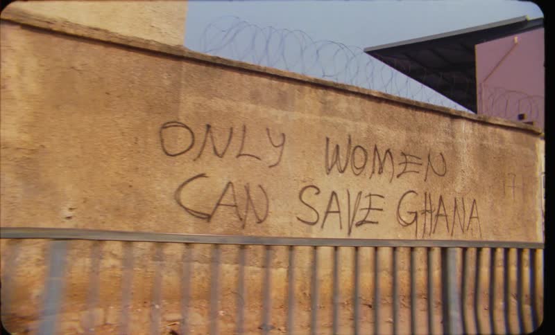 Graffiti on the wall of a third world country street
