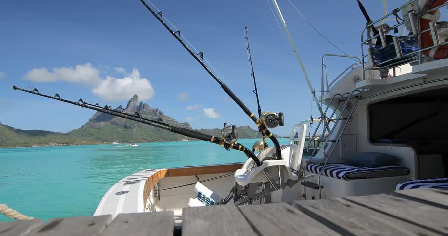 A large fishing boat parked at a dock