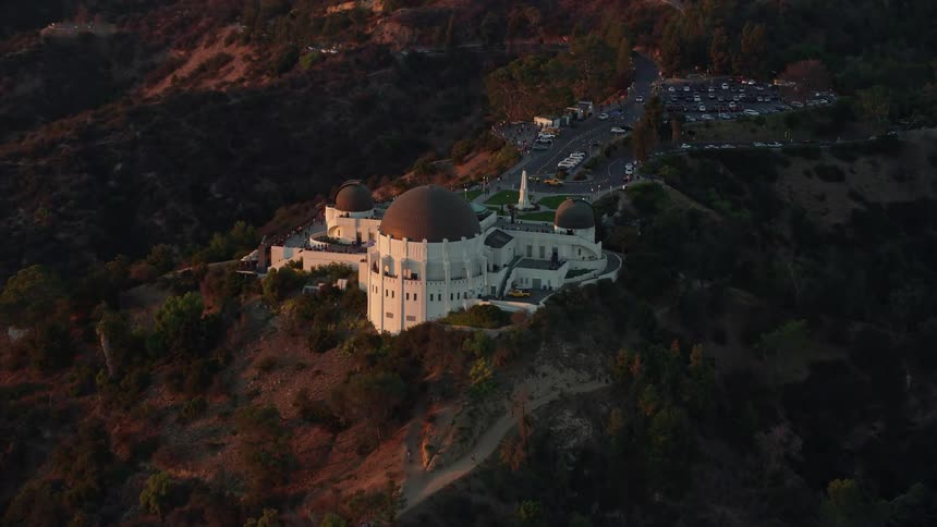 Approaching Griffith Observatory at twilight capturing iconic scientific facilities and structures in California