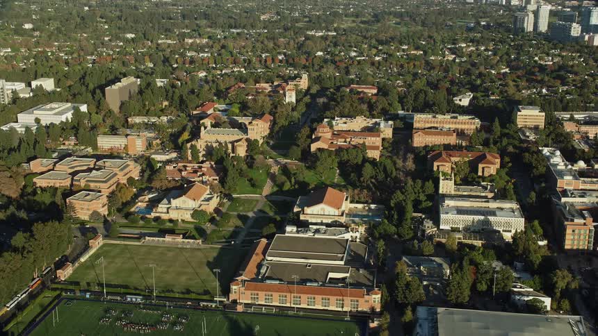 Aerial footage of Wilson Plaza at UCLA capturing college athletics recreation and the sunny California atmosphere