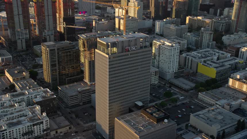A stunning aerial view of the Transamerica Center at twilight in downtown Los Angeles California