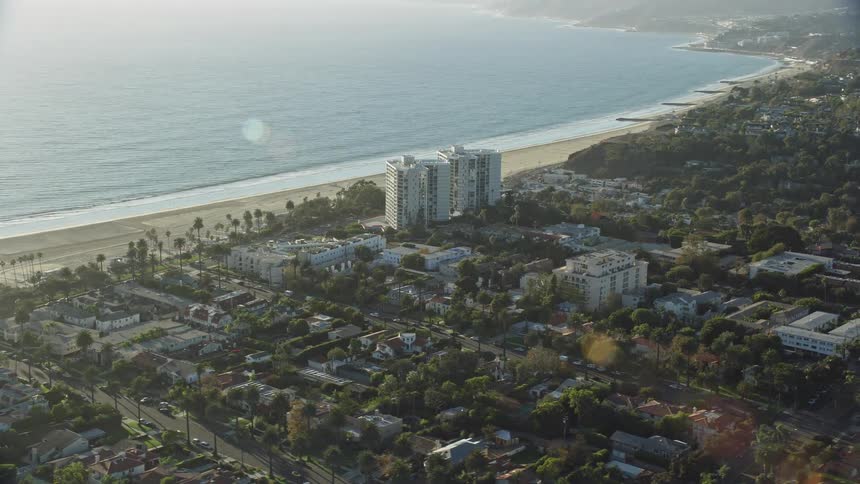 A breathtaking aerial view of the Ocean Towers Condominium Complex and the neighboring coastal neighborhoods in sunny Santa Monica California