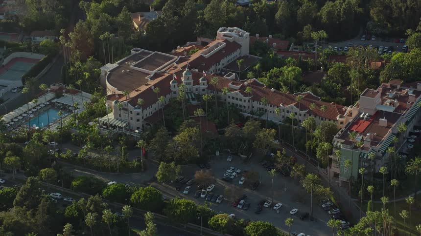 Beverly Hills Hotel in California is viewed from above in aerial footage during summertime