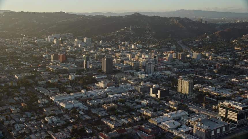 Flying over the office buildings in Hollywood California during daytime in a hazy southern California summer captured with a Shotover F1 camera on an Epic Helium