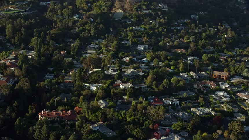 Aerial view of luxury mansions in Beverly Glen Los Angeles shot during summertime