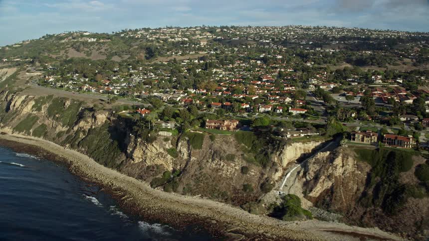 Experience the opulent lifestyle with a breathtaking aerial view of picturesque coastal mansions on the cliffs of Palos Verdes Estates California