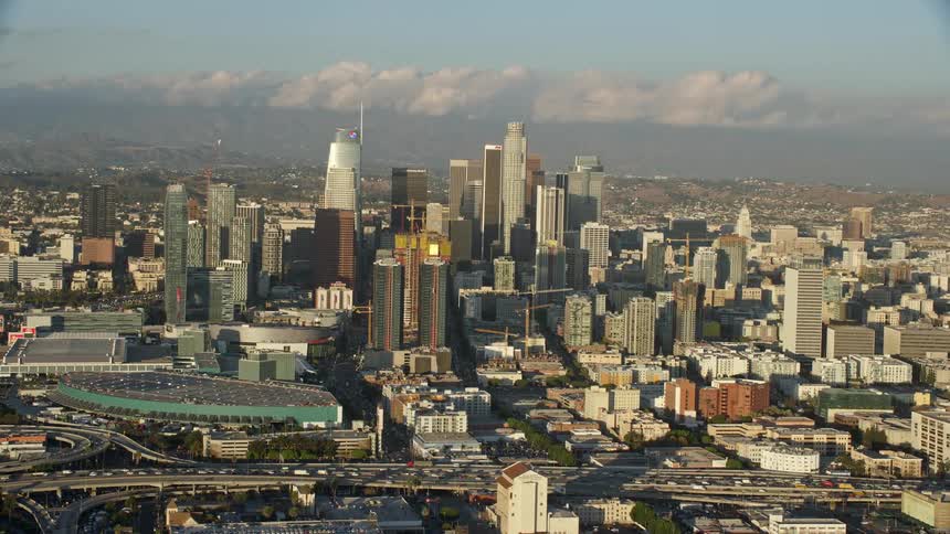 Aerial view of downtown Los Angeles California during the day showcasing its high rise buildings