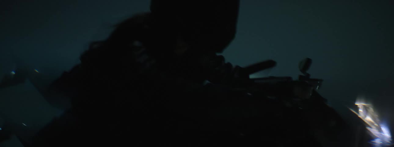 A woman is riding a motorcycle during the night time