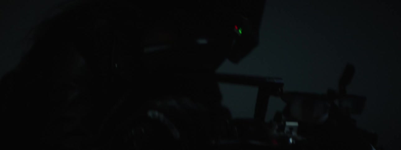 A person is riding the motorcycle at night