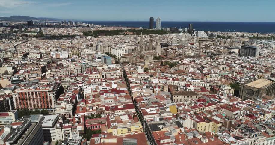 Aerial view of a populated city is displayed